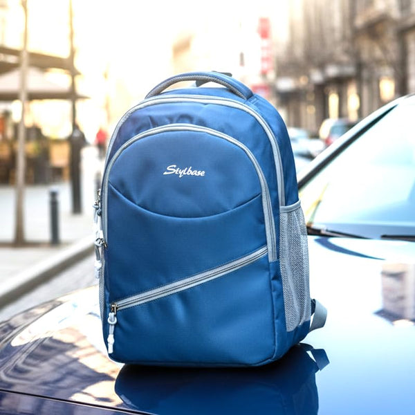 Unisex Casual Backpack School College & Travelling Use with 3 Compartments Bottle and Front Pocket - 20L  ( Blue)