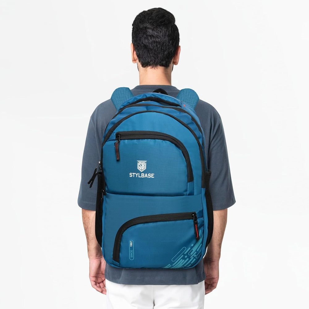 Unisex Casual Backpack School College & Travelling Use with 5 Compartments Bottle and Front Pocket - 25L ( Blue)